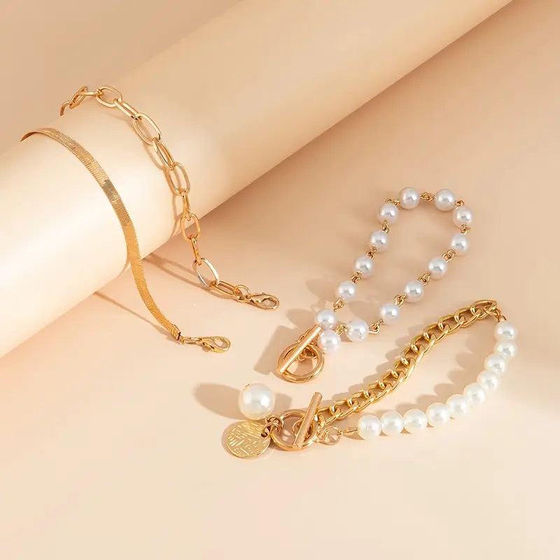 Chic Gold 4-Piece Bracelet Set – Snake, Pearls & Links | Gold 18k
